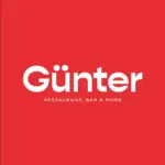 Weißer Text auf rotem Hintergrund: Günter in großen fetten Buchstaben, darunter RESTAURANT, BAR & MORE in kleinerer Schrift.