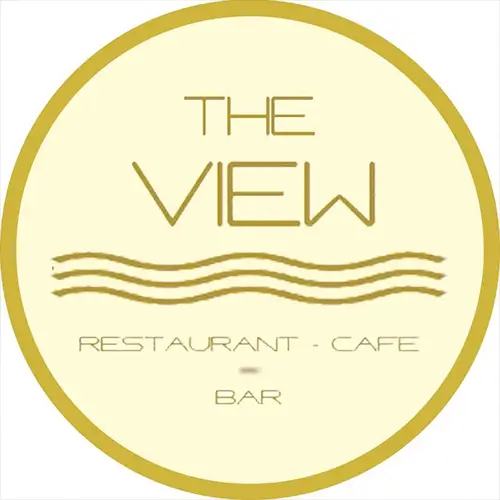 Ein kreisförmiges Logo mit goldener Umrandung zeigt den Text THE VIEW über drei gewellten goldenen Linien. Darunter steht RESTAURANT - CAFE und BAR in Gold auf einem hellen cremefarbenen Hintergrund.
